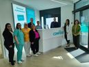 Parte dello staff Confident nello spazio accoglienza di piazza Manzoni, con Paolo Miglietta, Marco Nunziati, Manuela Maffioli ed Enza Riggio