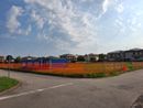 La recinzione che delimita l'area cantiere in via Lazio