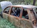 FOTO. Sacconago, a passeggio tra l’inciviltà. Rifiuti di ogni tipo, c’è anche la carcassa di un’auto