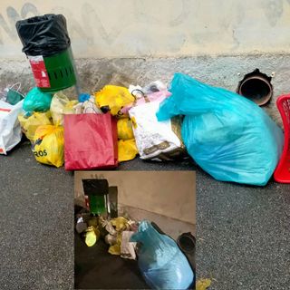 I rifiuti oggi (il cestino rosso è stato poi rimosso) e quelli ieri in via Muratori