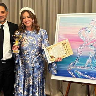 Manuela Carnini con l'ambasciatore Giulio Alaimo