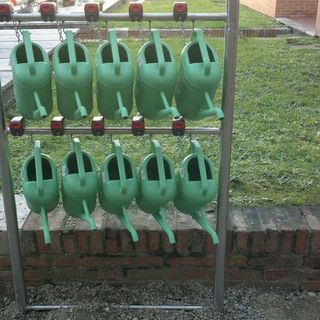 Anffas rimedia ai furti e dona innaffiatoi al Cimitero Parco di Legnano