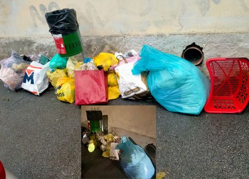I rifiuti oggi (il cestino rosso è stato poi rimosso) e quelli ieri in via Muratori I rifiuti oggi (il cestino rosso è stato poi rimosso) e quelli ieri in via Muratori