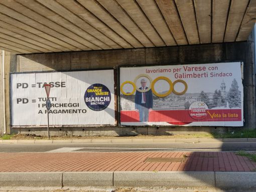 La campagna elettorale sui muri della città: Galimberti ci mette la faccia, Bianchi punta su tasse e strisce blu La campagna elettorale sui muri della città: Galimberti ci mette la faccia, Bianchi punta su tasse e strisce blu