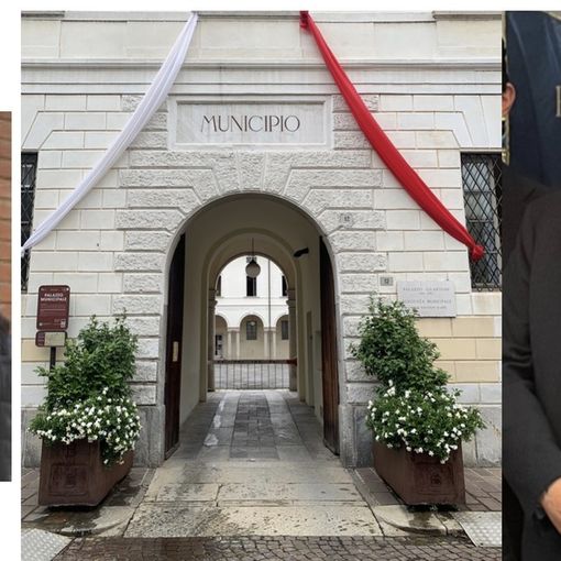 A sinistra Giavini, a destra Paglini: al centro il municipio &quot;vestito&quot; da patronale (foto da pagina Facebook Comune)