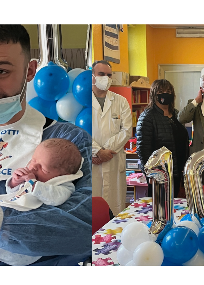 Carlos e Leonardo con papà Edoardo a lato la consegna dei bavaglini in pediatria