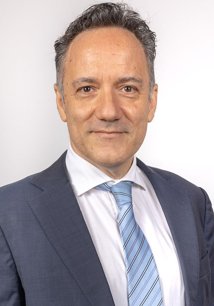 Michele Falcone. Sotto: Emilio Conti