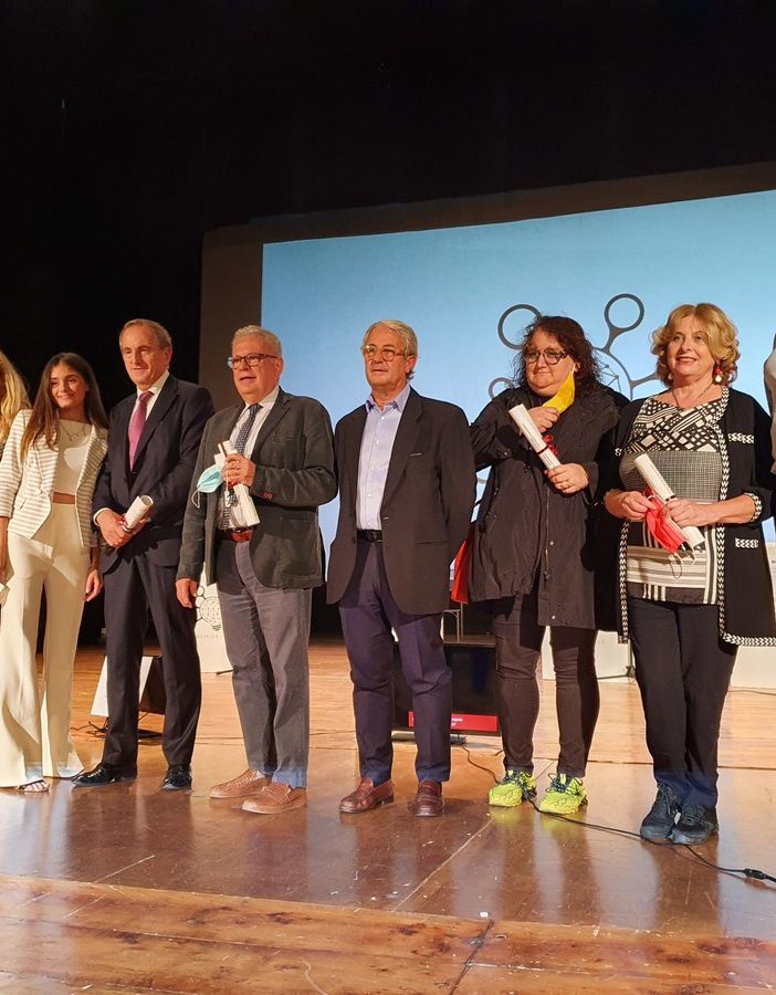 Candidati e organizzatori sul palco del teatro Sociale-Cajelli