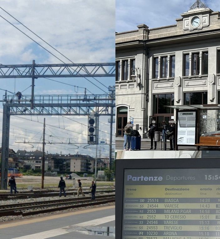 L'auto medica di Busto e sotto i tabelloni con i treni in tilt