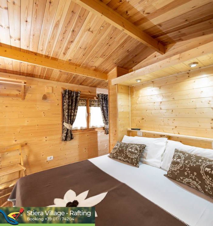La vacanza immersa nella natura? Chalet, sauna, piscina, rafting, cavalli ed i monti intorno