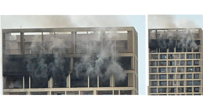 La torre colpita dall'incendio e uno zoom sui piani coinvolti: foto grazie a Raffaella Galli