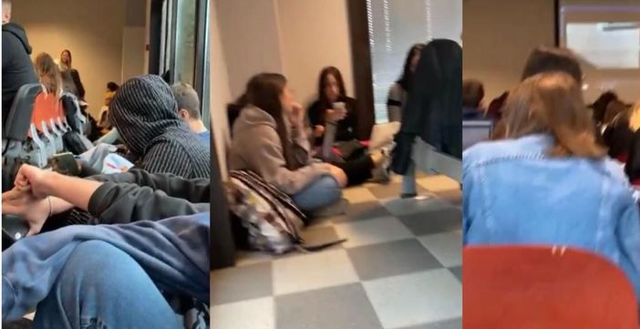 Aula gremita e studenti accomodati sul pavimento stamattina all'Insubria