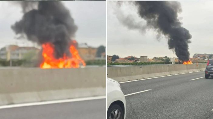 L'auto in fiamme sulla A8 (foto tratta da IlSaronno.it)