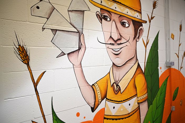 Lo Scoiattolo premiato a Cibus: murales aziendale con i ragazzi della comunità Il Pezzettino