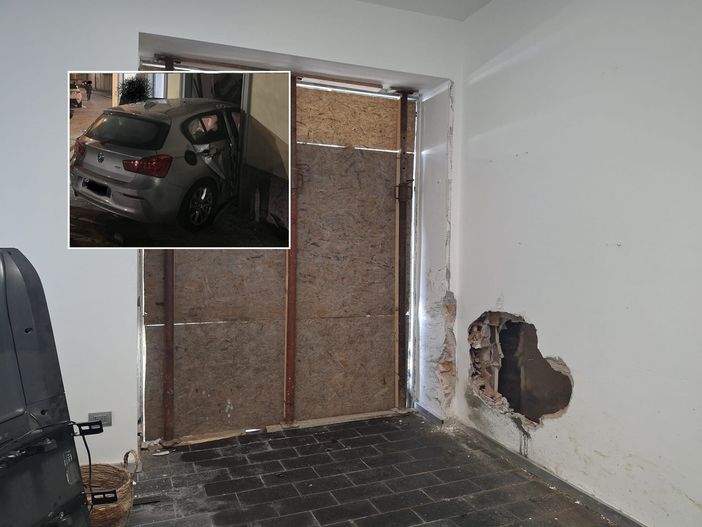 La vetrina distrutta e il muro sfondato dalla macchina che ha fatto visita allo Studio Emerald. Nel riquadro, il mezzo incastrato