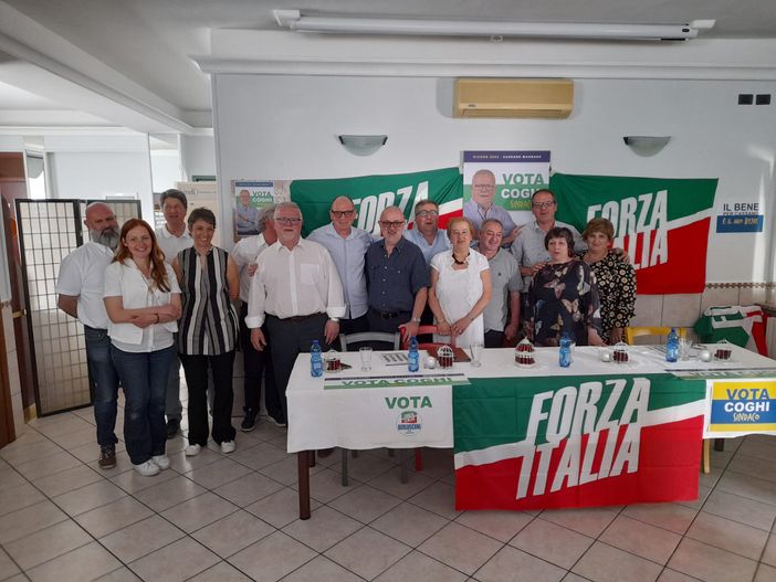 Osvaldo Coghi con la sua squadra