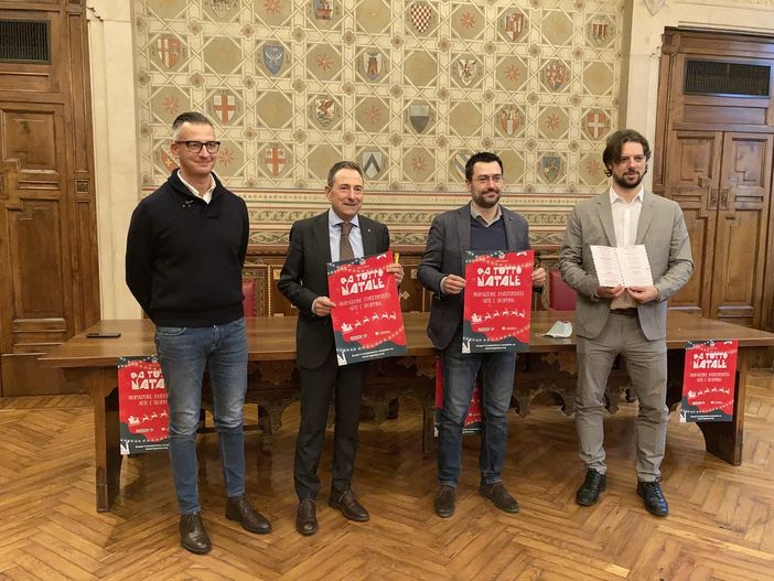 La presentazione nella sala degli stemmi
