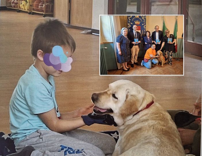 Una delle immagini che illustrano il libro dedicato ad Aut-Out. Nel riquadro, la conferenza stampa con la golden retriever Giada