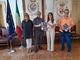 Da sinistra, Elena Balconi, don Riccardo Festa, Claudia Mazzetti e Riccardo Carù, storico volontario