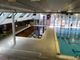 La piscina con acqua scura, una delle proteste dello scorso anno (foto d'archivio)