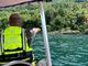 VIDEO E FOTO. Recuperato dai sommozzatori il cadavere rinvenuto nel pomeriggio sul fondo del lago Maggiore a Castelveccana