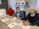 Il momento della firma tra i rappresentanti Aime e UGL