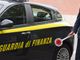 Percepiva il reddito di cittadinanza ma gestiva in casa una boutique di abiti contraffatti: donna di Rovellasca denunciata