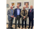 Da sinistra: Renzo Dionigi, Alberto Coen Porisini, Luca Del Baldo, Angelo Tagliabue davanti ai ritratti