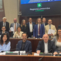 Il gruppo consiliare di Fratelli d'Italia e, sotto, il consigliere Romana Dell'Erba