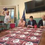 La conferenza stampa di presentazione del Campionato mondiale Kettlebell, nel riquadro Oleh Ilika in azione in sala giunta