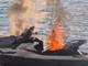 Le immagini della moto d'acqua in fiamme al pontile di Angera