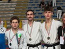 Zanovello, primo a sinistra, Stasi, al centro, e Averna, ultima a destra Zanovello, primo a sinistra, Stasi, al centro, e Averna, ultima a destra