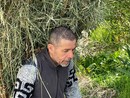 Giuseppe Reggiori al lavoro mentre trasporta fieno nel suo gerlo record