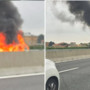 L'auto in fiamme sulla A8 (foto tratta da IlSaronno.it)