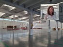 Il magazzino Swissport. Nel riquadro Marina Bottelli Il magazzino Swissport. Nel riquadro Marina Bottelli
