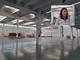 Il magazzino Swissport. Nel riquadro Marina Bottelli