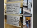 Il cartello, la vetrina spaccata e il titolare della gelateria Claudio Caputo che fa finta di pulire il vetro che non c'è più
