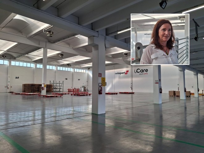 Il magazzino Swissport. Nel riquadro Marina Bottelli