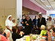 L'Arcivescovo Mario Delpini con il vescovo Roberto Busti e i malati durante l'ultimo pellegrinaggio diocesano a Lourdes (foto di Monica Fagioli)
