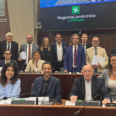 Il gruppo consiliare di Fratelli d'Italia e, sotto, il consigliere Romana Dell'Erba