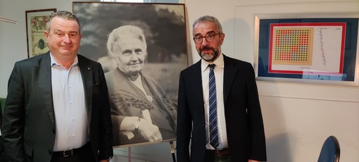Mauro Ghisellini con Benedetto Scoppola, presidente dell'Opera Nazionale Montessori. Sotto: un momento dell’assemblea nazionale svoltasi a Roma