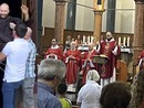 Don Lorenzo mentre celebra a destra e a lato mentre viene lanciato scherzosamente in aria (foto social dell'oratorio di Sant'Edoardo)