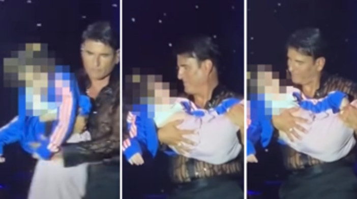 Sal Da Vinci nella bufera, abbraccia e bacia una bambina disabile durante il concerto: è polemica Sal Da Vinci nella bufera, abbraccia e bacia una bambina disabile durante il concerto: è polemica