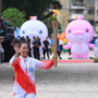 Cina, prima staffetta transfrontaliera della torcia per i Giochi Nazionali Cina, prima staffetta transfrontaliera della torcia per i Giochi Nazionali
